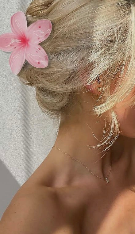 Sunny Clips pink flower hair clip in hair