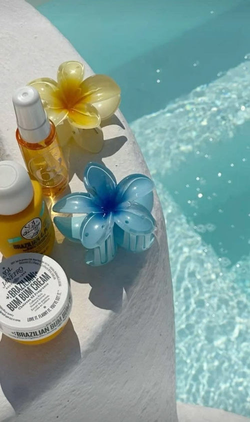 Sunny Clips flower hair clips by pool